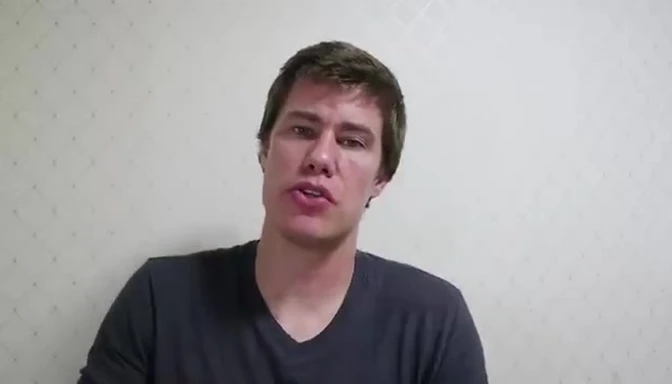 Reference image: speaker talking to camera